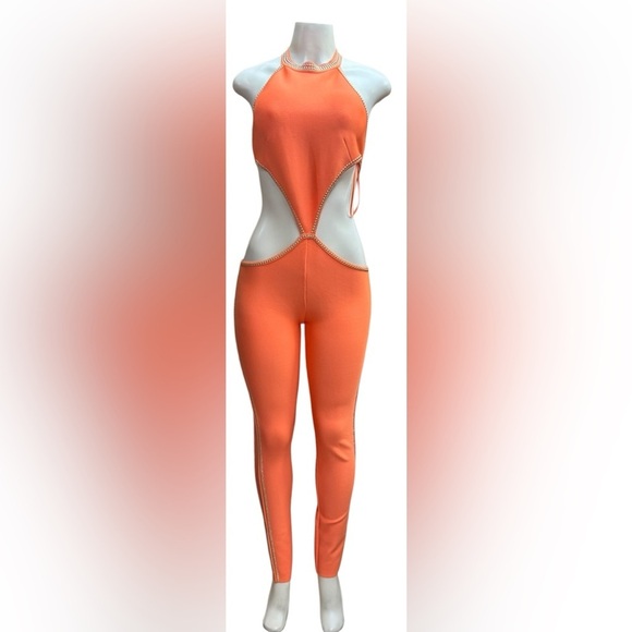 FASHION NOVA. Vibrant Orange Cutout Jumpsuit - Picture 4 of 7
